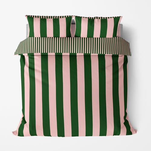 Striped pillowcase with green and pink vertical stripes on a white background